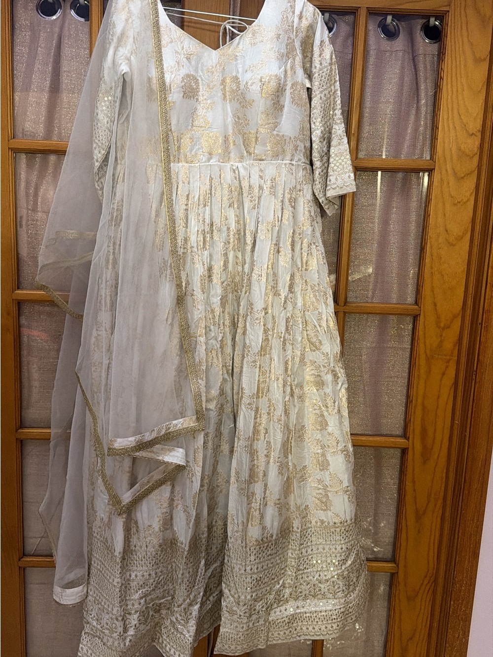 White and gold banarasi gown with net dupatta